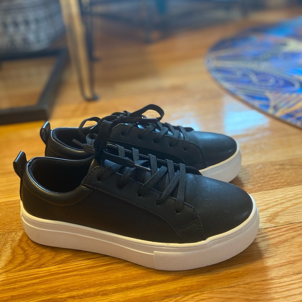 Black platform sneakers